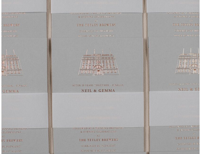 Venue Illustrated wedding invitation in rose gold foil on soft grey card